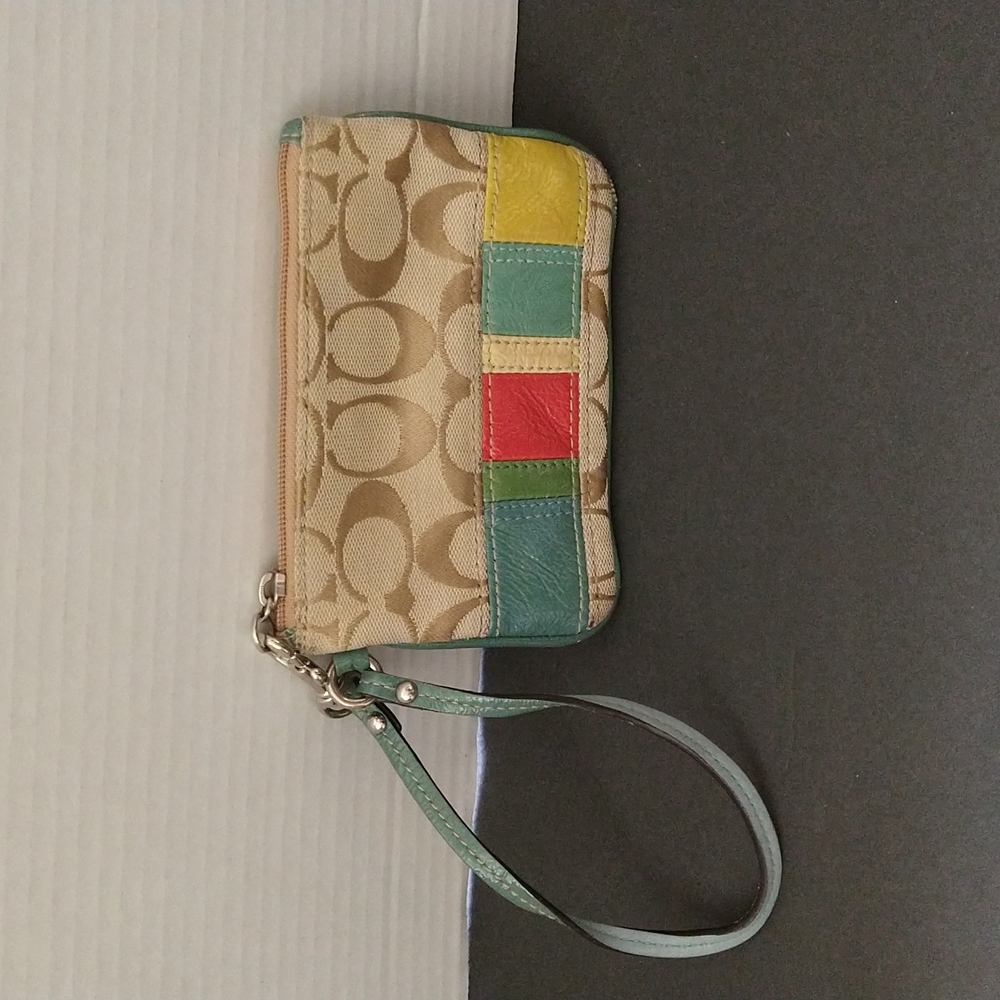 GUC. Coach multicolored wristlet.